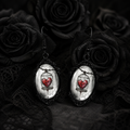 Boucles d'oreilles cœur dans cage